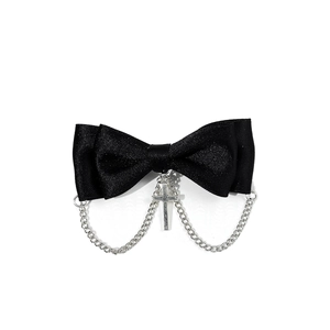 Gothic black satin bow hair clip with silver heart cross chain in punk aesthetic style