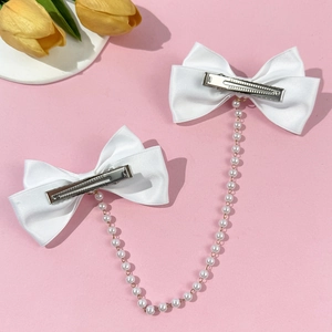Elegant white satin bow hair clips with long pearl chain for a sweet princess look