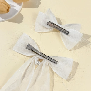 Elegant white chiffon bow hair clips with pearls and long tassels for women