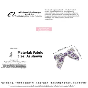 Detailed view of purple floral bow hair clip with size 14x10.5cm and 15.7g weight info