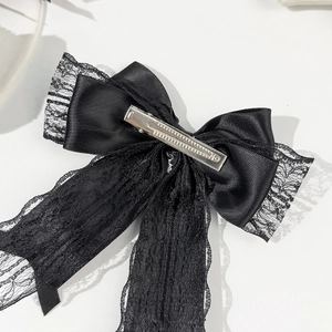 Elegant black satin and lace bow hair clip with a sturdy metal alligator clip back