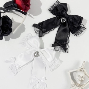 Gothic lace bow hair clips with rhinestone hearts in black and white satin fabric