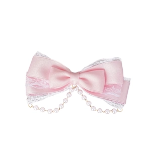 Pink satin bow hair clip with white lace trim and hanging pearls in Lolita style