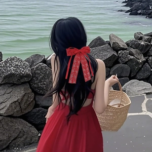 Elegant French red lace bow hair clip for women, perfect for vintage styling and holidays