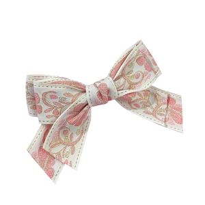 Ethnic style floral embroidered bow hair clip with gold trim for elegant women
