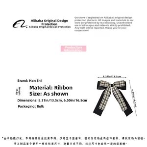 Detailed view of checkered bow hair clip showing dimensions of 13.5cm by 16.5cm