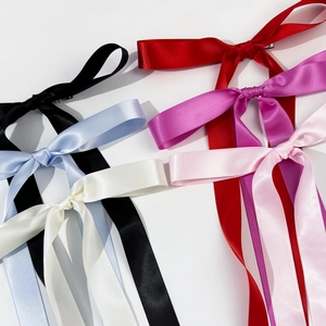 Long satin ribbon bow hair clips set in various colors including red black and pink