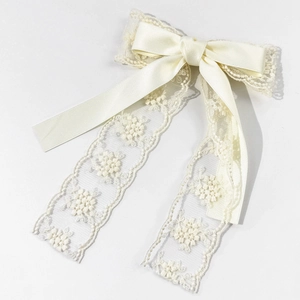 Barrette à cheveux élégante avec nœud en dentelle crème, broderie florale et longs rubans