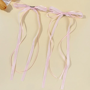 Pink checkered lace bow hair clips with long tassels in a sweet ballet style set of two