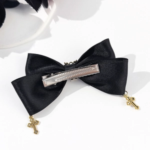 Gothic black satin bow hair clip with golden cross charms and punk style metal center