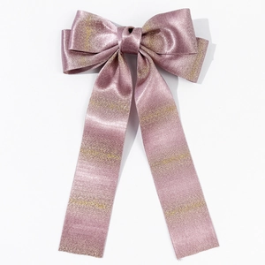 Elegant purple bow hair clip with gold glitter stripes and long streamers for women