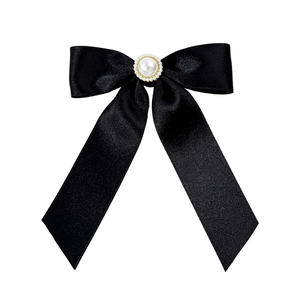 Elegant black satin bow brooch with a large white pearl and gold bead center decoration