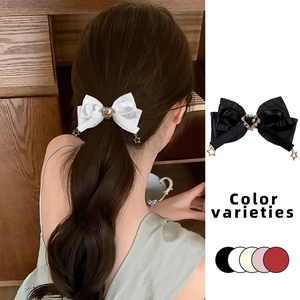 Barrette à nœud élégante avec gemme en cœur et breloques étoiles en cinq coloris chic