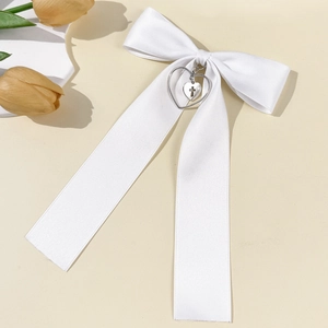 White satin long tail bow hair clip with silver heart cross pendant for women