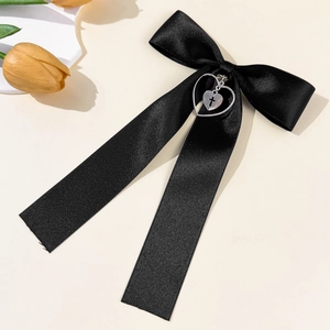 Elegant black satin bow hair clip with silver double heart and cross pendant decoration