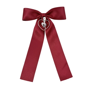 Elegant wine red satin bow hair clip featuring a silver double heart cross pendant charm