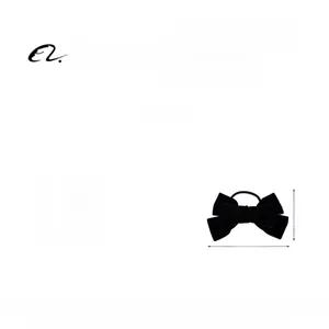 Detailed view of black velvet bow hair tie with dimensions 13.5cm by 9cm and soft texture