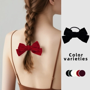 Elegant velvet bow hair scrunchies for women available in multiple colors like red and black