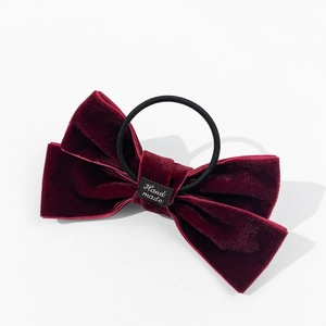 Handmade burgundy velvet bow hair tie with double-layer design and high elasticity band