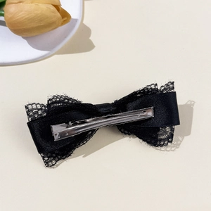 Elegant black lace and satin bow hair clip with silver metal alligator clasp detail