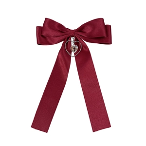 Classic burgundy satin bow hair clip featuring a heart-shaped cross metal pendant