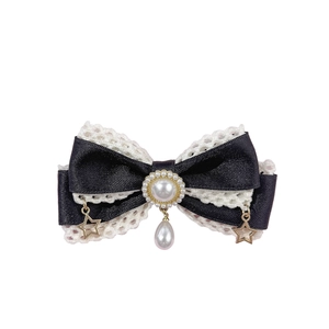 Pinza para el pelo Lolita con lazo negro, encaje blanco, perlas y colgantes de estrellas doradas