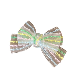 Rainbow ribbon bow hair clip with colorful wavy embroidery on semi-transparent tulle fabric