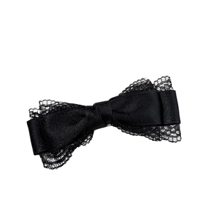 Elegant black satin hair clip with lace trim in a bow design for women's hairstyle