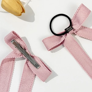 Pink ribbon bow hair clip and elastic band set with lace edges and handmade tag