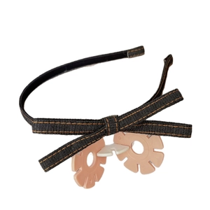 Retro dark blue denim headband with double bow and orange topstitching details