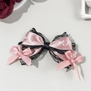 Elegant pink satin and black lace bow hair clip with decorative print for Lolita style