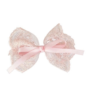 Pink lace bow hair clip with layered delicate fabric and satin ribbon for women