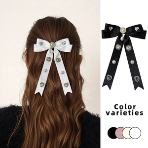 Luxuriöse Haarspange mit Satinschleife, Strass und Perlen in Schwarz und Weiß