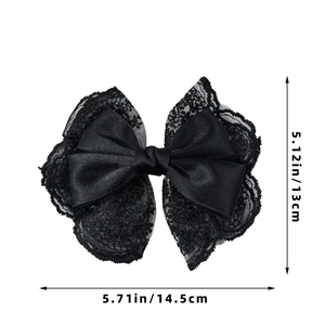 Detail view of lace bow hair clip showing dimensions of 14.5cm by 13cm on white backdrop