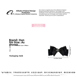 Detail showing dimensions of black lace bow hair clip with vintage rhinestone center