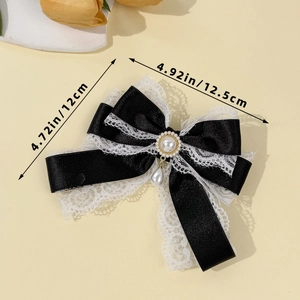 Lolita style black ribbon bow hair clip with white lace trim and pearl pendant