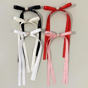 Fermagli per capelli a fiocco in raso con perle e nappe lunghe in cinque colori eleganti
