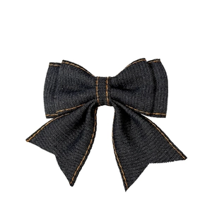Classic denim bow hair clip with contrast stitching and long ribbon tails for women