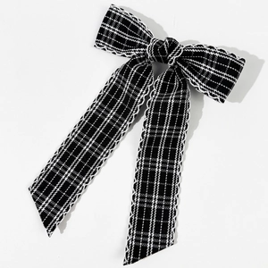 Japanese style black and white plaid bow hair clip with lace edges and long ribbons