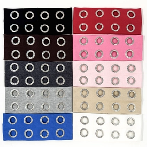 Bandeaux en tricot côtelé élastique avec oeillets métalliques en dix coloris variés