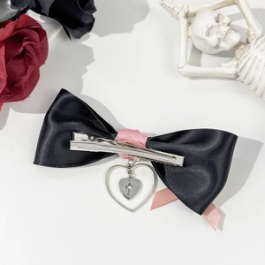 Lolita style pink and black bow hair clip with silver heart and cross charms