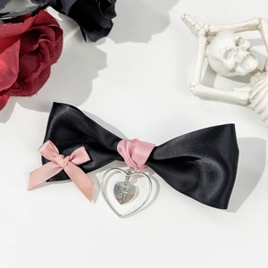Gothic Lolita bow hair clip with pink ribbon and silver heart cross pendant detail