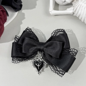 Gothic black lace bow hair clip featuring a silver metal heart and cross pendant