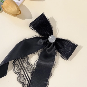 Elegant black lace bow brooch pin with satin ribbon and silver metal buckle closure