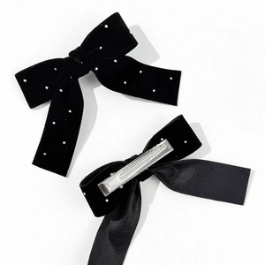 Elegant black velvet bow hair clips with silver rhinestones and metal alligator clips