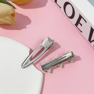 Y2K style silver metal heart star hair clips with sleek brushed texture finish