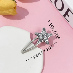 Detailed size view of silver starfish hair clip showing 7.3cm length and 3.5cm width