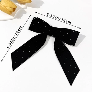 Detailed size view of black velvet bow hair clip with rhinestones, 16cm by 14cm dimensions