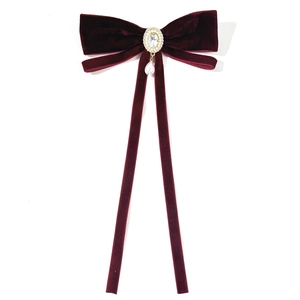 Elegant burgundy velvet bow tie accessory with rhinestone center and pearl drop pendant