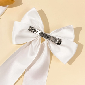 Elegant large white satin bow hair clip with a sturdy metal spring clasp for women